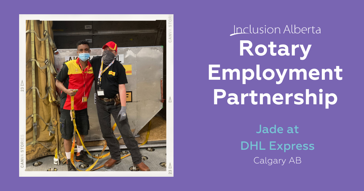 Inclusion Alberta Rotary Employment Partnership. Jade at DHL Express, Calgary, AB. Jade and a colleague pose together in front of loading equipment, one of them is holding ratchet straps.